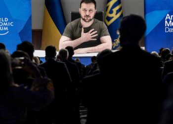 FILE - Ukrainian President Volodymyr Zelenskyy addresses by videolink the opening plenary session hosted by Klaus Schwab, Founder and Executive Chairman, World Economic Forum, left, during the 51st annual meeting of the World Economic Forum, WEF, in