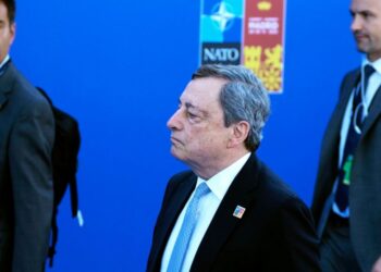 FILE - Italian Prime Minister Mario Draghi, center, arrives for the NATO summit in Madrid, Spain on Wednesday, June 29, 2022. Italian Prime Minister Mario Draghi's offer to resign has sent unsettling ripples through financial markets, bringing back b