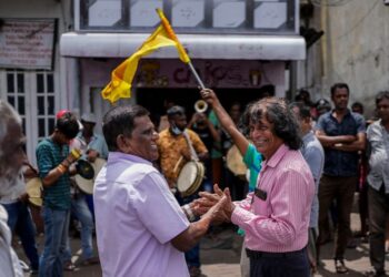 Supporters of Acting President and Prime Minister Ranil Wickremesinghe celebrate after he was elected president in Colombo, Sri Lanka, in Colombo, Sri Lanka, Wednesday, July 20, 2022. Sri Lankan lawmakers chose six-time Prime Minister Wickremesinghe
