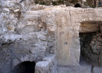 The site of a Jewish ritual bath or mikveh, left, discovered near the Western Wall in the Old City of Jerusalem, Sunday, July 17, 2022. An excavation to build an accessible elevator from the Jewish Quarter to the Western Wall near the Temple Mount by