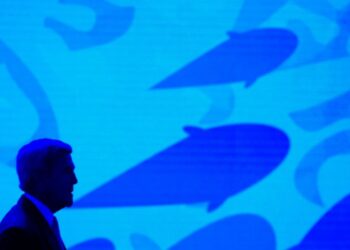 FILE - Secretary of State John Kerry stands onstage against a video backdrop of ocean life during the Our Ocean, One Future conference at the State Department in Washington, Thursday, Sept. 15, 2016. Diplomats from around the world have failed to rea