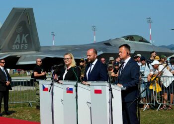 From right, Defense Ministers of Poland Mariusz Blaszczak, of Slovakia Jaroslav Nad and of Czech Republic Jana Cernochova answer questions to media after signing an air policing treaty at an airshow in Malacky, Slovakia, Saturday, Aug. 27, 2022. Pola