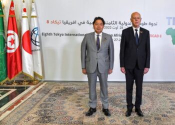Tunisia's President Kais Saied, right, and Japan's Foreign Minister Yoshimasa Hayashi pose for a photo during the eighth Tokyo International Conference on African Development (TICAD) in Tunisia's capital Tunis on Saturday, Aug. 27, 2022. African head