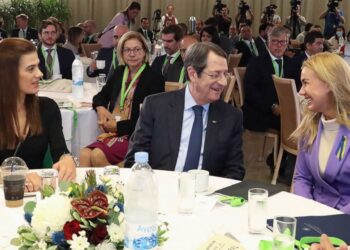 This photo provided by Cyprus press and information office, European Union's energy commissioner Kadri Simson, right, Cyprus president Nicos Anastasiades, center and Cyprus' energy minister Natasa Pilides talk during the East Mediterranean Gas Forum