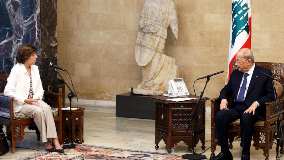 In this photo released by Lebanon's official government photographer Dalati Nohra, Lebanese President Michel Aoun, right, meets with French Foreign Minister Catherine Colonna at the presidential palace in Beirut, Lebanon, Friday, Oct. 14, 2022. Colon